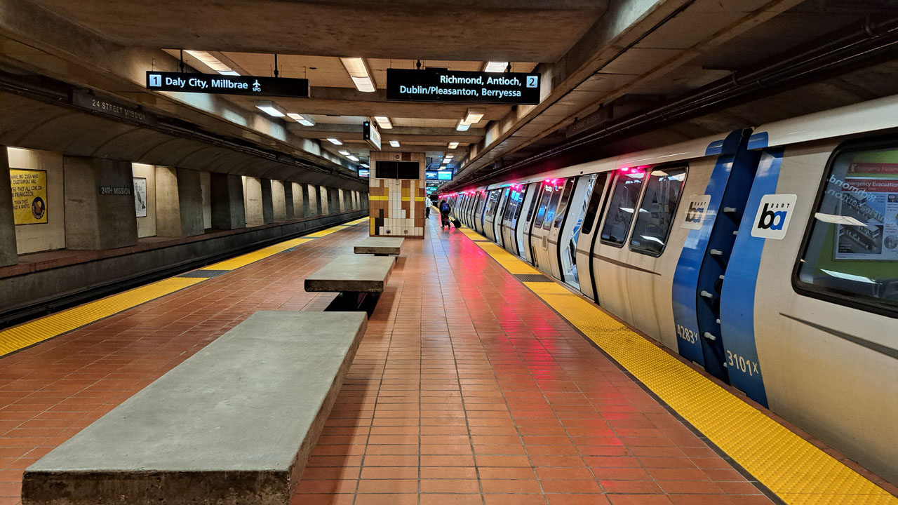 A BART train arriving at 24th Street Mission station